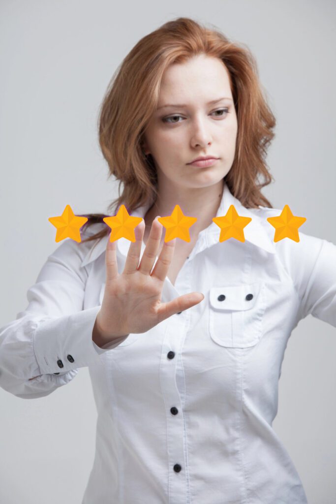 Five star rating or ranking, benchmarking concept. Woman assesses service, hotel, restaurant Five-star rating or ranking